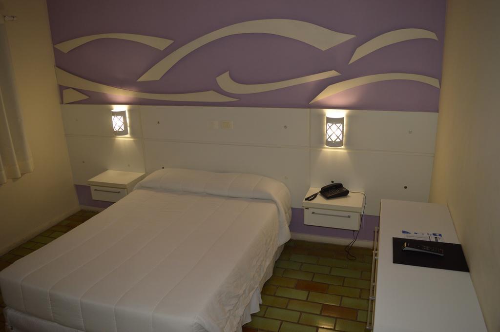 27 Praia Hotel - Frente Mar Bertioga Bilik gambar