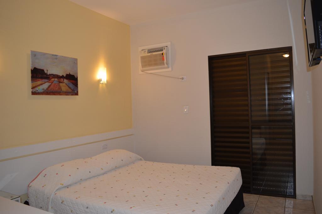 27 Praia Hotel - Frente Mar Bertioga Bilik gambar
